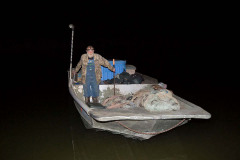 Ronnie Hopkins in his Boat. Kentucky Lake.  2015 – Bob Hower